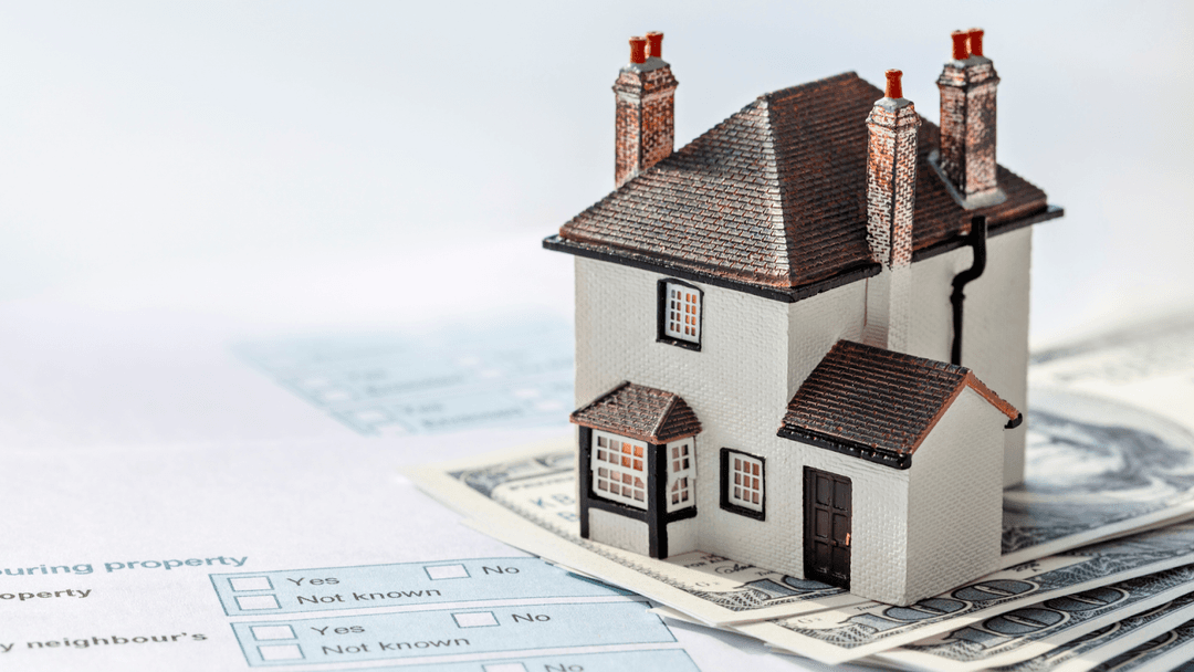 House on money, mortgage or property real estate tax